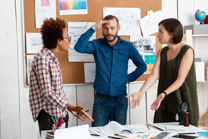 Developer working on hybrid CMS integration across multiple screens