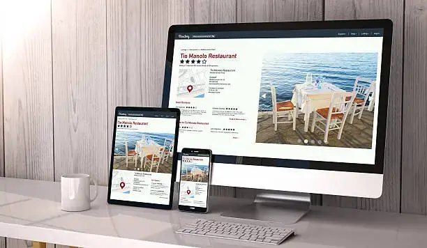 multiple devices showing different website layouts based on device type